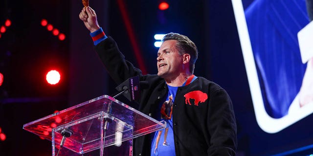 NFL Network host Kyle Brandt presents on stage during round three of the 2022 NFL Draft on April 28, 2022 in Las Vegas.