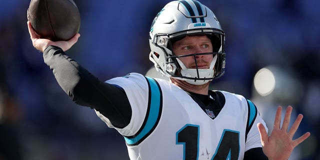 Quarterback Sam Darnold #14 of the Carolina Panthers warms up against the Baltimore Ravens at M&amp;T Bank Stadium on November 20, 2022 in Baltimore, Maryland.