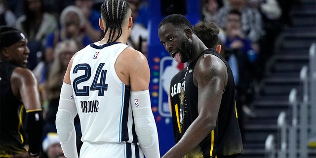 Draymond Green, #23 of the Golden State Warriors, taunts Dillon Brooks, #24 of the Memphis Grizzlies, during the fourth quarter at Chase Center on December 25, 2022, in San Francisco, California. 