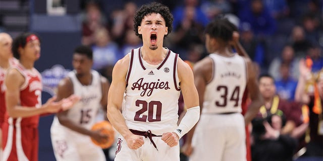 Andre Gordon #20 of the Texas A&amp;M Aggies celebrates against the Arkansas Razorbacks during the quarterfinals of the 2023 SEC Basketball Tournament on March 10, 2023, in Nashville, Tennessee. 