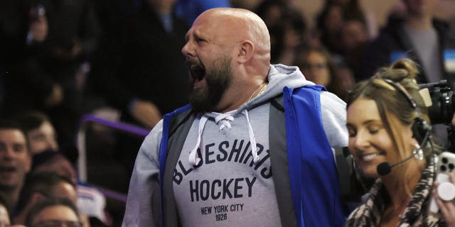 Brian Daboll the head coach of the Giants cheers on the New York Rangers against the Washington Capitals at Madison Square Garden on March 14, 2023.