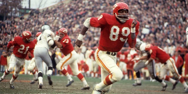 Kansas City Chiefs wide receiver Otis Taylor runs a route in a game against the Oakland Raiders at Municipal Stadium in Kansas City, Missouri, on Nov. 23, 1967.