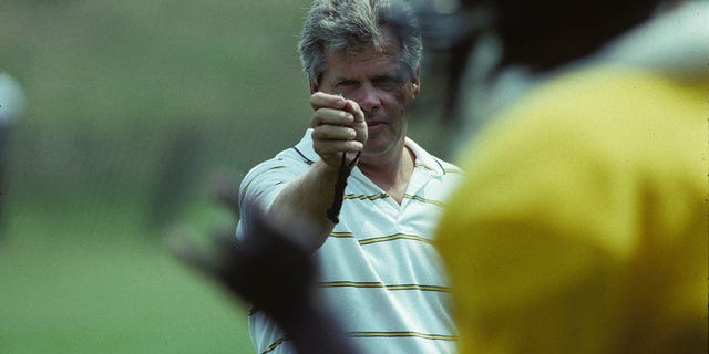 Pittsburgh Steelers Director of Personnel Dick Haley uses a stopwatch to time players in the 40-yard dash at summer training camp at St. Vincent College in July 1991 in Latrobe, Pennsylvania.