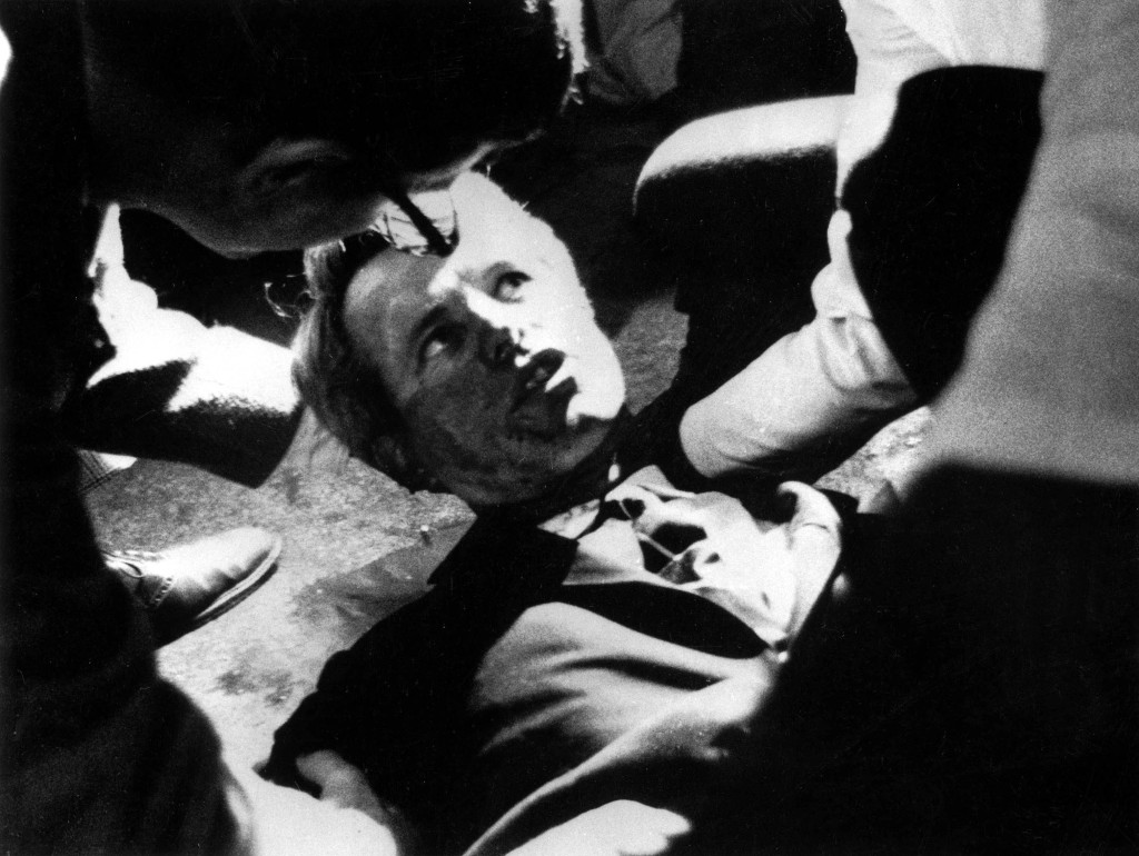 Senator Robert F, Kennedy lies on the floor of the Ambassador hotel just after being shot.