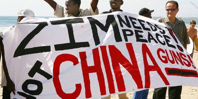 Members and supporters of the Kwazulu-Natal Christian Council and Diakonia Council of Churches on April 19, 2008 protest against the offloading of arms from China destined for poverty-stricken Zimbabwe. A ship carrying arms from China destined for Zimbabwe left South Africa on April 18, 2008 after a court barred its cargo from being transported to the border.