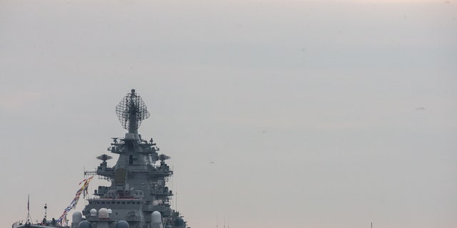 The Russian Navy's Pyotr Velikiy (Peter the Great) nuclear battlecruiser and Russian Navy's TK-208 Dmitry Donskoy nuclear submarine is prepared for the Navy Day parade in Kronshtadt of the suburb of St. Petersburg.