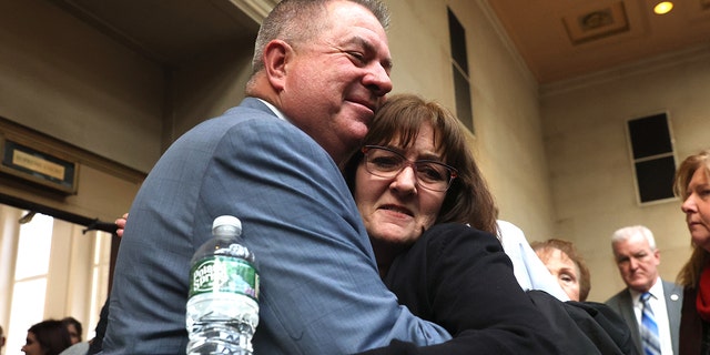 On Dec. 5, 2022, a homicide detective hugs Darlene Altman, whose mother, Diane Cusick, was killed by serial killer Richard Cottingham in 1968.