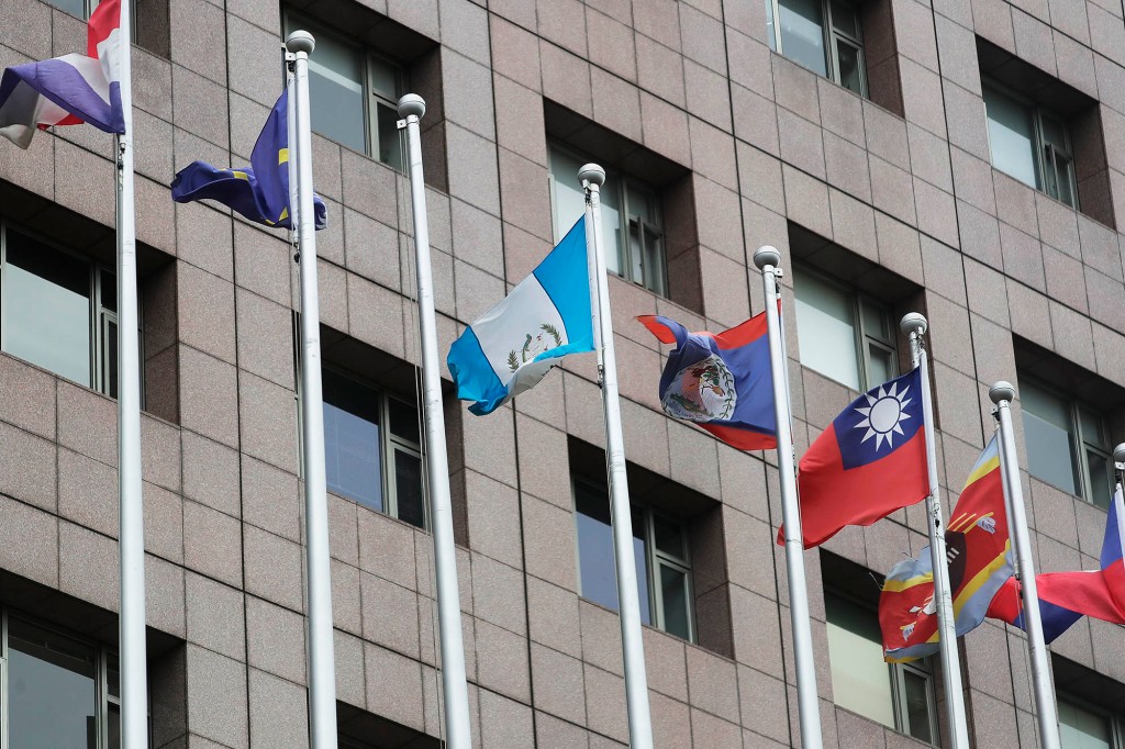 The Honduras national flag used to fly on the vacant third pole to the left outside the Diplomatic Quarter building in Taipei, Taiwan, on March 26, 2023.