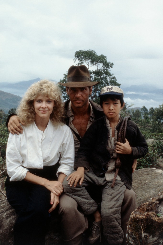 Cate Capshaw (from left), Harrison Ford and Ke Huy Kwan on the on the set of 1984's "Indiana Jones and the Temple of Doom." 