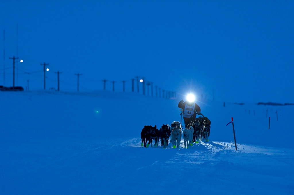 Brent Sass drives his team along the beach as he finishes the Iditarod Trail Sled Dog Race, March 18, 2020, near Nome, Alaska.