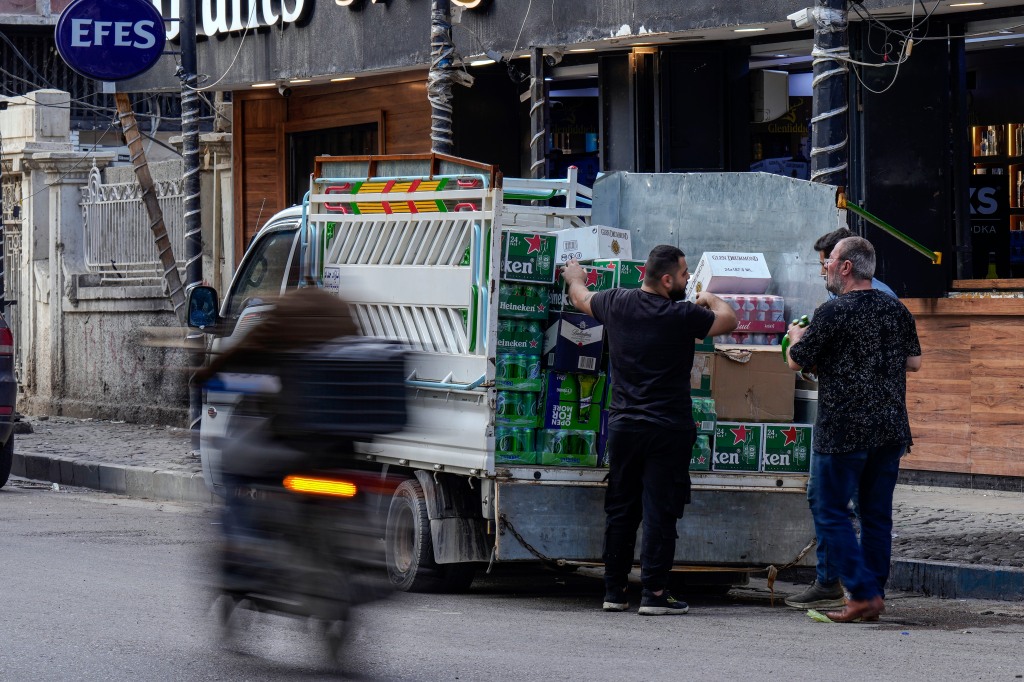 Cases of beer are delivered to a liquor store in Baghdad, Iraq on March 9, 2023.