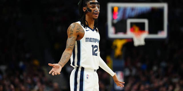 Memphis Grizzlies guard Ja Morant reacts to a foul during the Nuggets game at Ball Arena on March 3, 2023, in Denver.