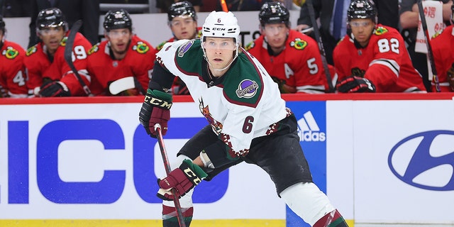 Jakob Chychrun of the Arizona Coyotes skates with the puck against the Chicago Blackhawks during the first period at United Center Feb. 10, 2023, in Chicago.