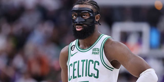 Boston Celtics guard Jaylen Brown looks on during free throws by the Utah Jazz in the fourth quarter of the game at Vivint Arena in Salt Lake City on Saturday.