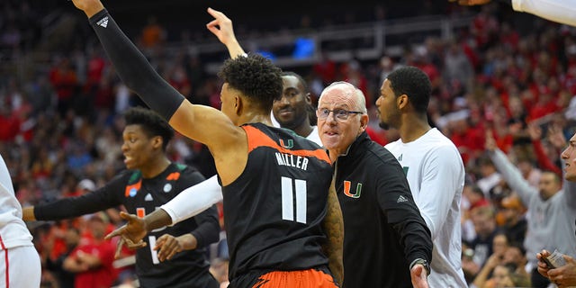 Head coach Jim Larranaga of the Miami Hurricanes cheers on guard Jordan Miller, #11, against the Houston Cougars during the Sweet Sixteen round of the 2023 NCAA Men's Basketball Tournament Midwest Regionals held at T-Mobile Center on March 24, 2023, in Kansas City, Missouri. 
