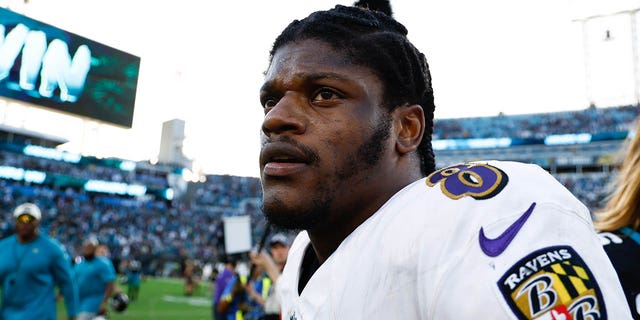 Baltimore Ravens quarterback Lamar Jackson, #8, looks on after losing to the Jacksonville Jaguars at TIAA Bank Field in Jacksonville, Florida, Nov. 27, 2022.