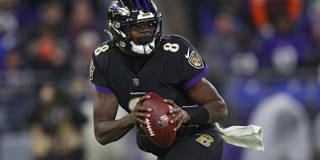 Ravens quarterback Lamar Jackson looks to pass against the Cleveland Browns at M&amp;T Bank Stadium on Nov. 28, 2021, in Baltimore.