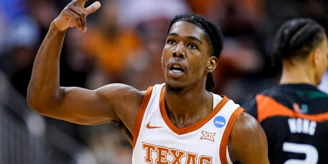 Mar 26, 2023; Kansas City, MO, USA; Texas Longhorns guard Marcus Carr (5) reacts against the Miami Hurricanes in the second half at the T-Mobile Center.