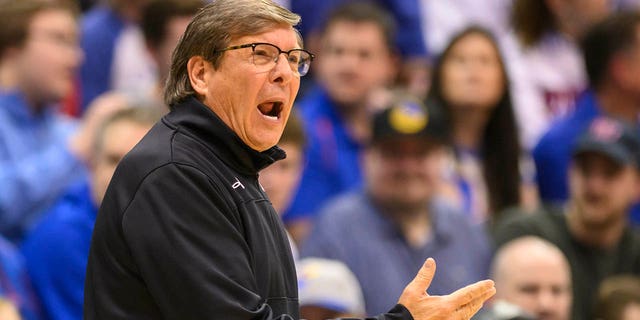 Texas Tech head coach Mark Adams calls instructions to his team against Kansas during the first half of an NCAA college basketball game in Lawrence, Kan., Tuesday, Feb. 28, 2023. 