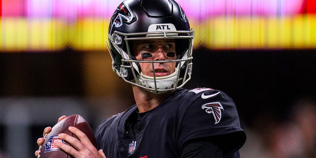 Atlanta Falcons quarterback Matt Ryan warms up before a game against the New Orleans Saints Jan. 9, 2022, in Atlanta. 