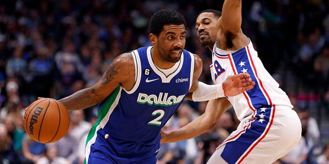 Kyrie Irving of the Dallas Mavericks drives to the basket against DeAnthony Melton of the Philadelphia 76ers in the second half of the game at American Airlines Center in Dallas on Thursday.