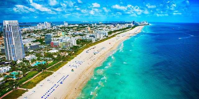 The white sands and turquoise ocean of beautiful Miami Beach, Florida as shot from an altitude of about 500 feet during a helicopter photo flight.