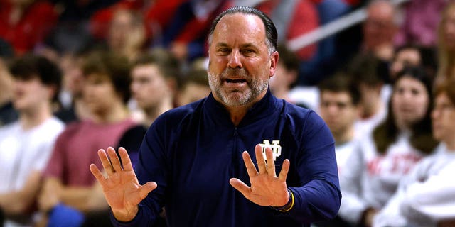 Head coach Mike Brey of the Notre Dame Fighting Irish reacts during their game against the NC State Wolfpack at PNC Arena on January 24, 2023 in Raleigh, North Carolina.