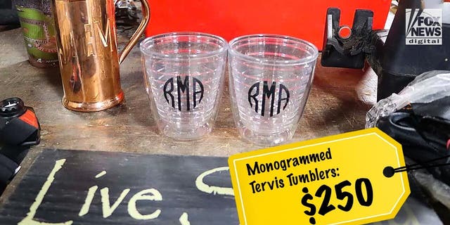 A pair of tumblers with Alex Murdaugh's monogrammed initials told for $250.