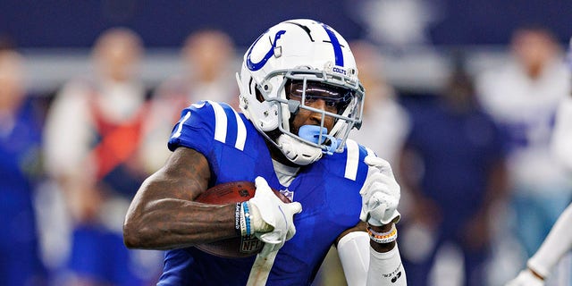 Parris Campbell #1 of the Indianapolis Colts runs the ball during a game against the Dallas Cowboys at AT&amp;T Stadium on December 4, 2022, in Arlington, Texas. The Cowboys defeated the Colts 54-19.