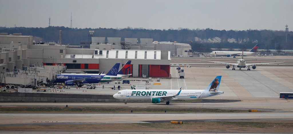 A spokesperson for Frontier told The Independent,  “The video fails to show that the customer using the sizer box had an additional carry-on bag."
