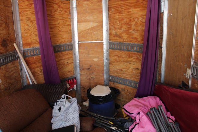 The inside of the trailer the girls were kept in.