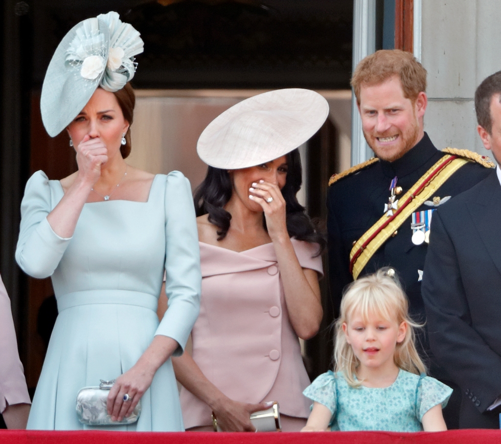 Catherine, Duchess of Cambridge, Meghan, Duchess of Sussex, Prince Harry, Duke of Sussex and Isla Phillips stand on the balcony of Buckingham Palace during Trooping The Colour 2018 on June 9, 2018 in London, England