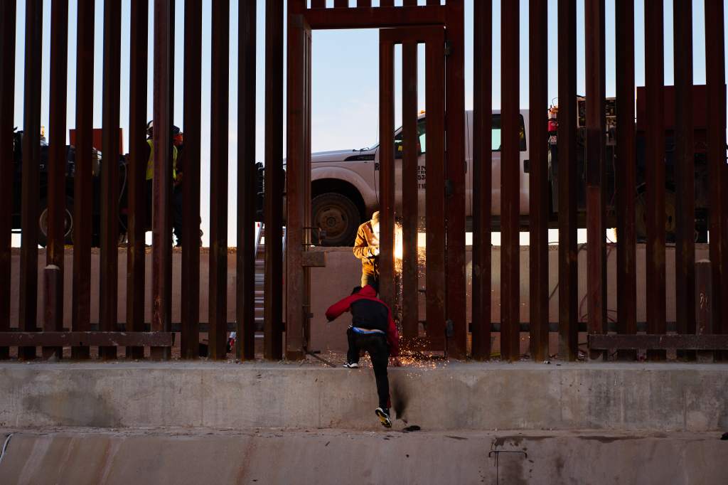 A migrant crossing the border.