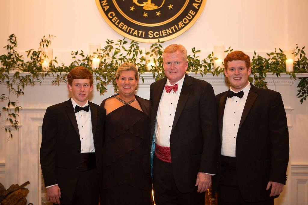 Far left: Paul and Maggie, followed by husband Alex and brother Buster in formal attire