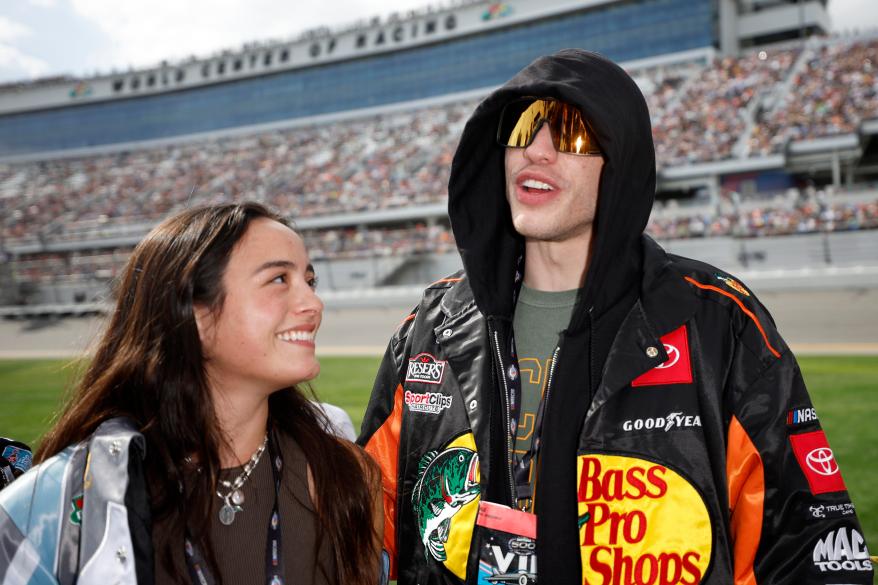 Pete Davidson and Chase Sui talk on the grid prior to the NASCAR Cup Series 65th Annual Daytona 500 at Daytona International Speedway on Feb. 19.