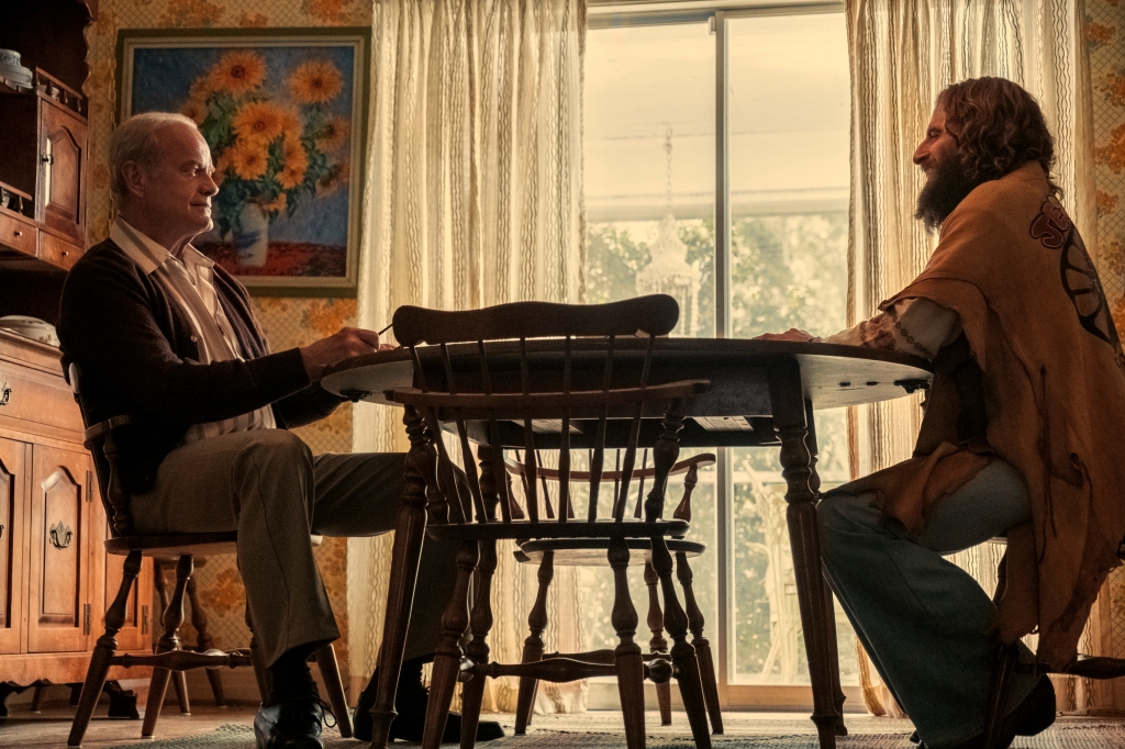 This image released by Lionsgate shows Kelsey Grammer, left, and Jonathan Roumie in a scene from "Jesus Revolution." 