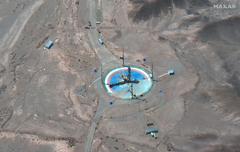 A satellite image from Maxar Technologies shows a rocket preparing to be erected at a launch pad at Imam Khomeini Space Center southeast of Semnan, Iran on Tuesday, June 14, 2022.