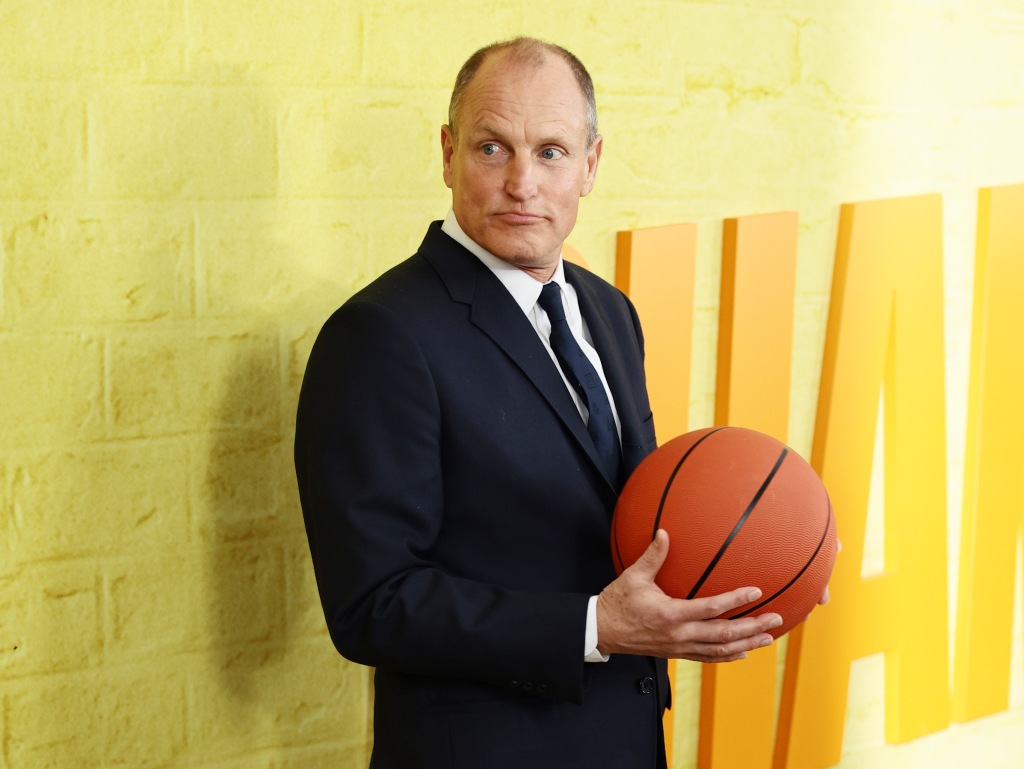 Woody Harrelson with basketball for "Champions."