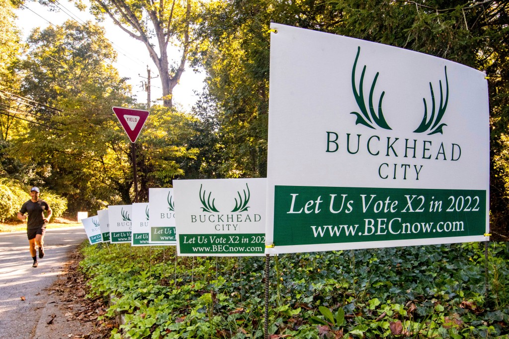 Yard signs supporting the grassroots initiative to incorporate Buckhead.