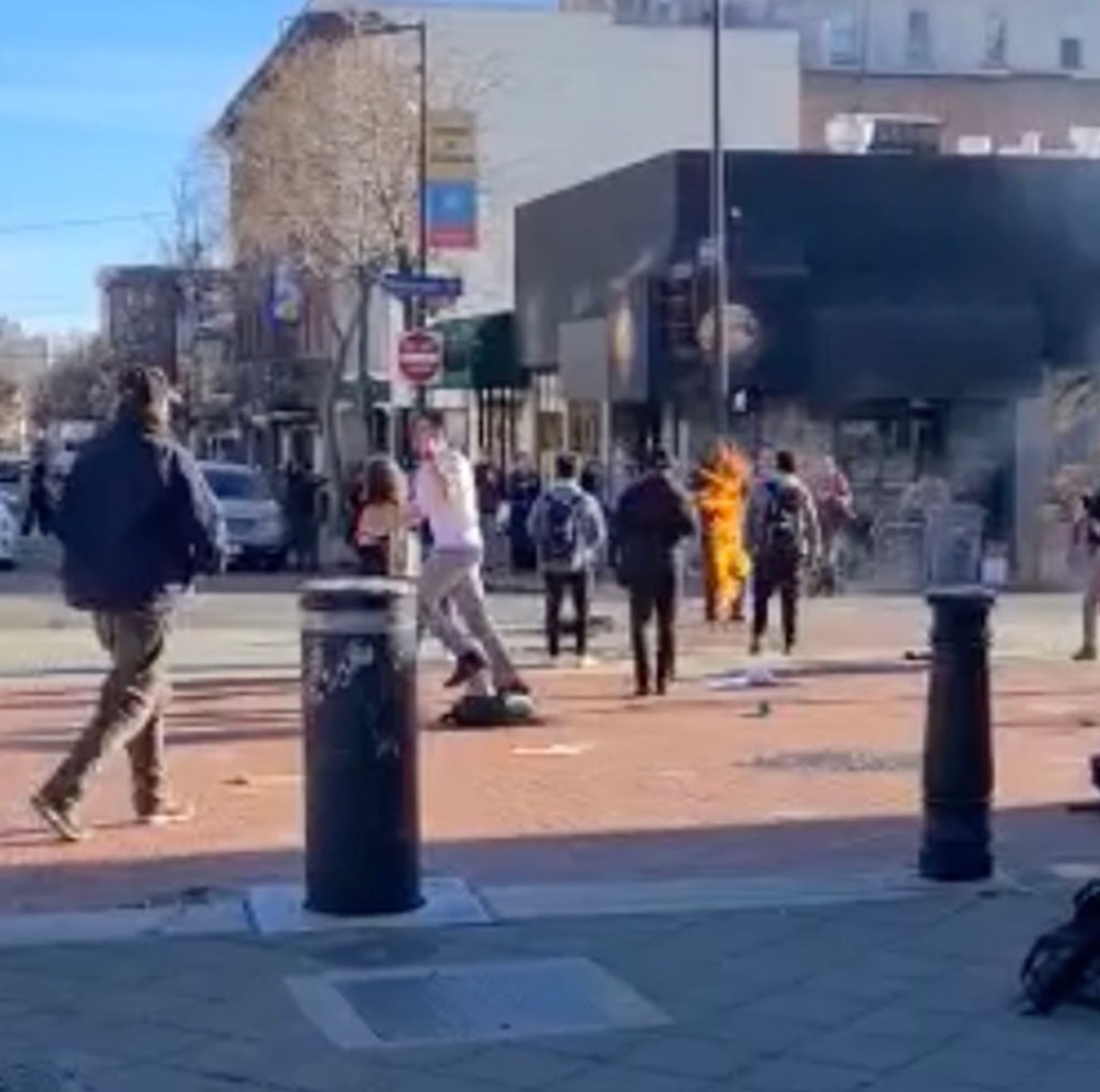 Screenshot from bystander video shows a man engulfed in flames