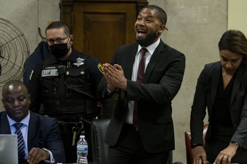 Jussie Smollett speaks to Judge James Linn after his sentence is read on March 10, 2022, at the Leighton Criminal Court Building in Chicago.