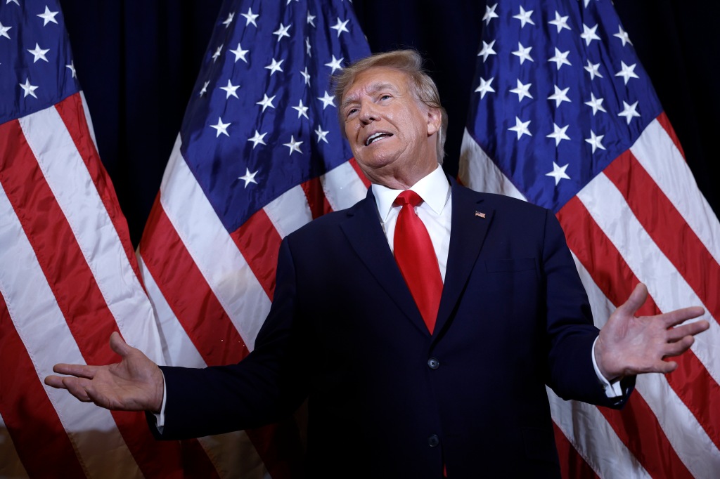 Former President Donald Trump speaks to reporters on Saturday before his speech to the Conservative Political Action Conference. 