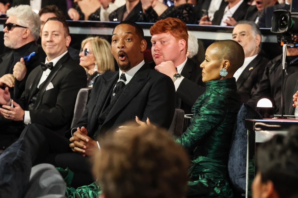 Will Smith reacts during last year's Oscars ceremony.