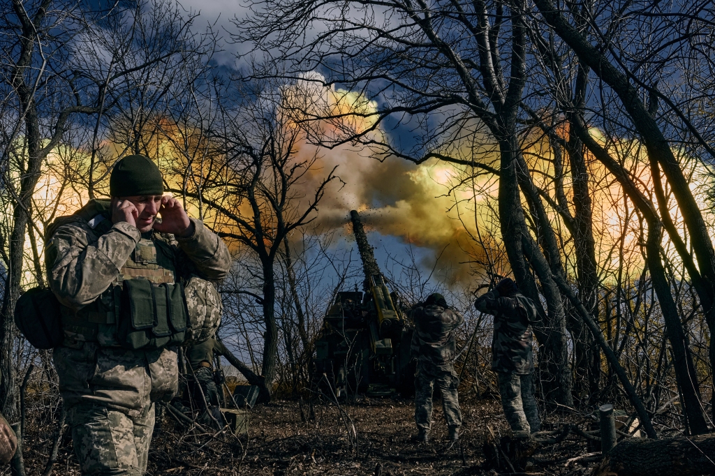 Ukrainian soldiers fire a self-propelled howitzer towards Russian positions near Bakhmut, Donetsk region, Ukraine, Sunday, March 5.