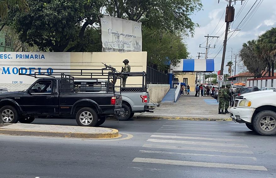 Mexican authorities search for evidence as they work to locate four Americans who were shot by gunmen and then kidnapped shortly after crossing the border.