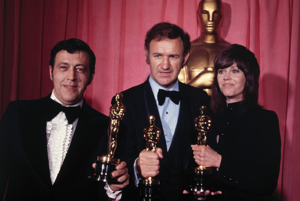 Hackman is seen holding his Best Actor Oscar at the 1972 Academy Awards. "The French Connection" producer Philip D'Antoni is seen at left. Best Actress winner Jane Fonda is seen at right. Fonda won her gong for "Klute."