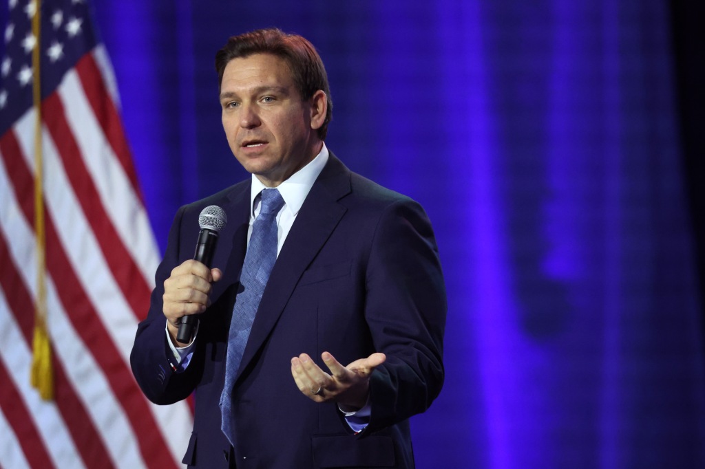 Florida Gov. Ron DeSantis, seen addressing a crowd in Iowa on March 10, has seen his support slip among Republican 2024 primary voters. 
