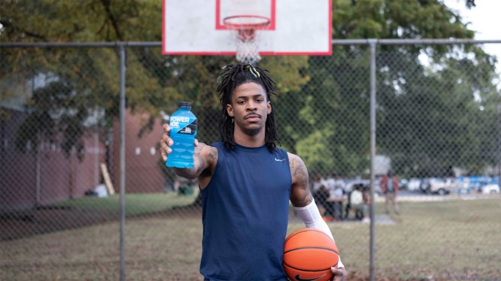 Ja Morant holding a Powerade bottle during his ad campaign. 