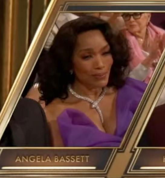 Angela Bassett sits and scowls after Jamie Lee Curtis wins Best Supporting Actress.