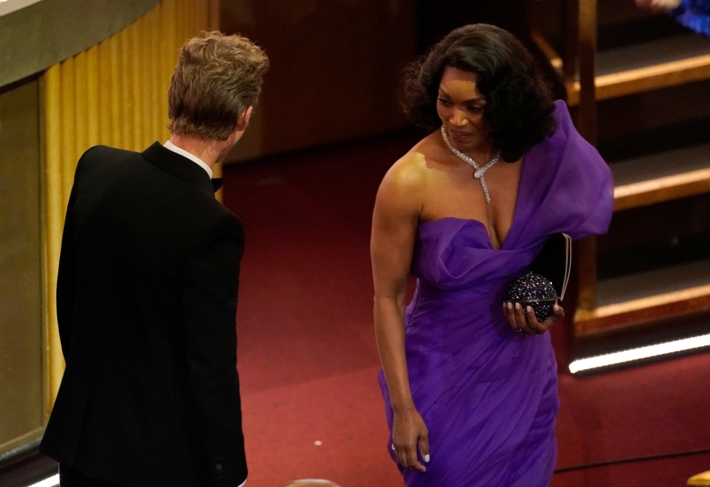 Austin Butler, left, and Angela Bassett are seen in the audience at the Oscars on Sunday, March 12, 2023, at the Dolby Theatre in Los Angeles.
